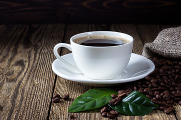 Cup of coffee on wooden rustic table