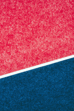 Detail of red and blue sheets of construction paper