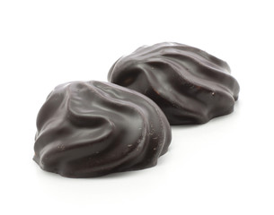 Dark chocolate-coated zefir isolated on white background two glossy.