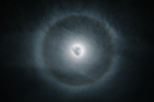 mystic moon surrounded by a circle