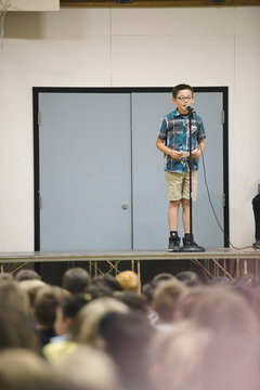 Boy Giving Speech At School