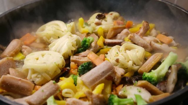 frozen pasta blocks defrost thaws steaming cooking pan