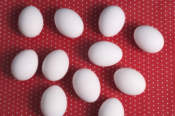 Easter eggs on a red and white background