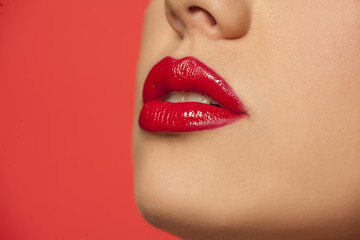woman's lips with red lipstick