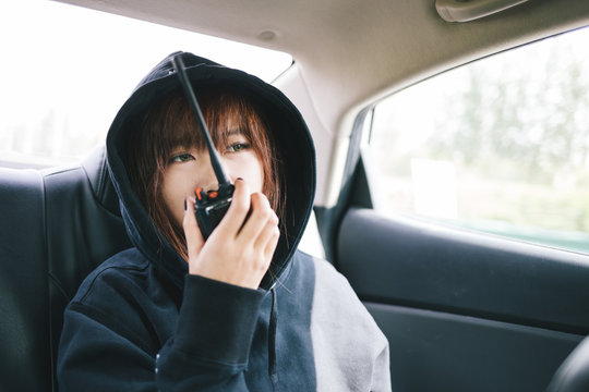 young lady sitting in the car