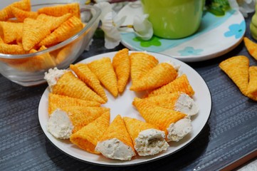 Cones stuffem with cottage cheese with spices - appetizer
