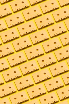 Yellow cassette tapes background