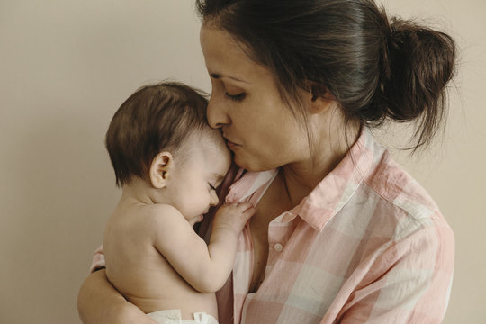 Young Mother With Her Baby