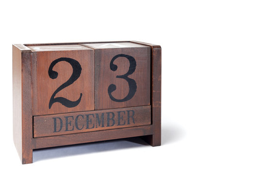 Wooden Perpetual Calendar set to December 23rd