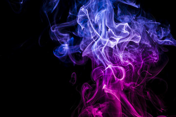 Colored smoke on black background