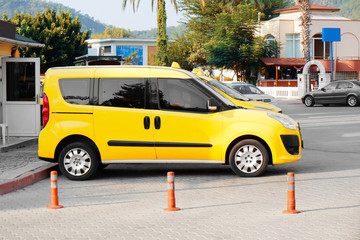 Obraz premium Taxi cars standing in parking zone