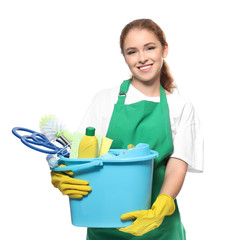 Young professional with cleaning supplies, isolated on white