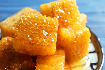 Fresh honeycombs on plate, closeup