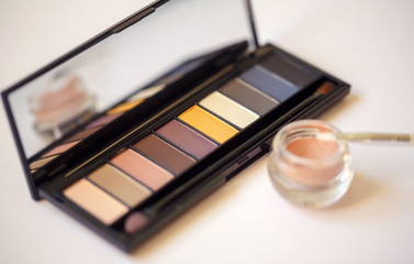 women's cosmetics set on background .