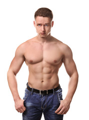 Fototapeta premium Muscular young bodybuilder on white background