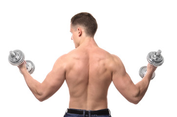Fototapeta na wymiar Muscular young bodybuilder with dumbbells on white background