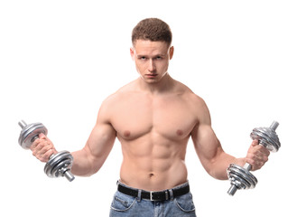 Muscular young bodybuilder with dumbbells on white background