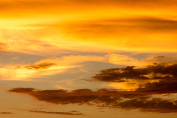 Fototapeta na wymiar Dramatic sky with orange clouds at sunset