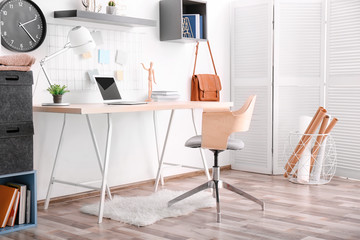 Fototapeta na wymiar Modern office interior with table and armchair