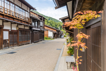 Fototapeta na wymiar View of old Japanese town with traditional wooden architecture. Narai-juku post town in Kiso Valley, Japan
