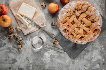 Composition with delicious apple pie on table