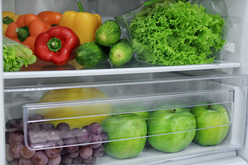 Fresh vegetables and fruits in refrigerator