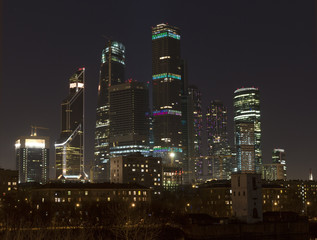 Fototapeta na wymiar Dark skyscrapers of the Moscow city at night