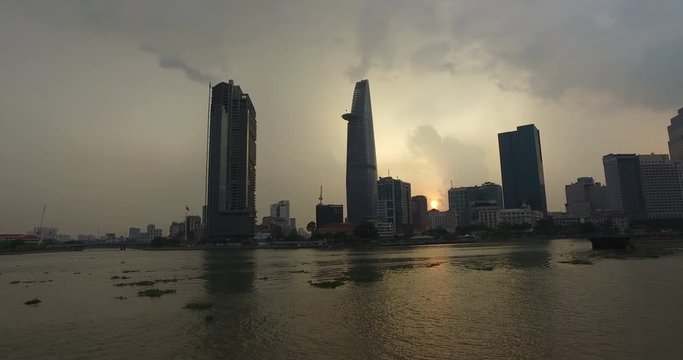 Video shot of Ho Chi Minh city centre at sunrise with Saigon river and skyscrapers in view