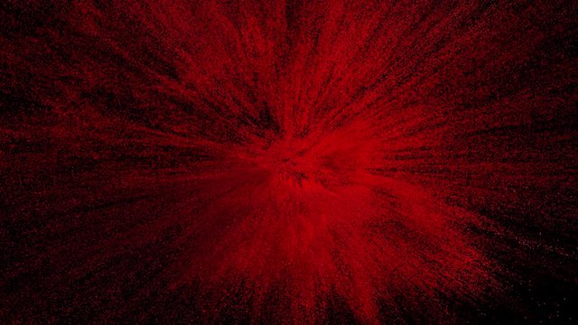 red powder explosion on black background. Slow motion movement with acceleration in the beginning. Cg animation Has alpha matte