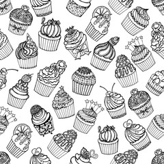 Seamless pattern of hand drawn sketch style cupcakes. Vector illustration isolated on white background.