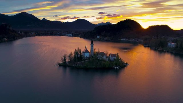 Aerial drone view of Lake Bled with St. Marys Church of the Assumption on the small island; Bled, Slovenia, Europe.