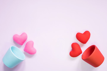 Top view of flat lay mockup with romantic decoration Romantic, St valentine's day concept with valentines mini pin heart on pot pink background with copy space minimal style.