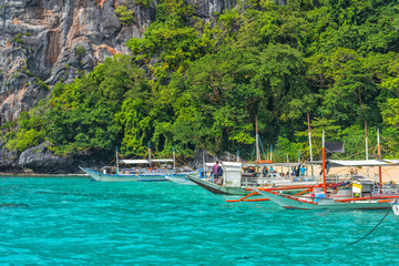 Naklejka na ściany i meble El Nido bay scenic islands view with bangka boats, Palawan, Philippines