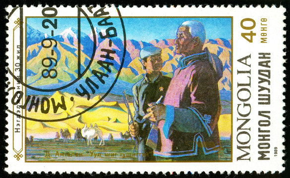 Ukraine - circa 2018: A postage stamp printed in Mongolia shows Two men, mountains. Series: Paintings. Circa 1989.