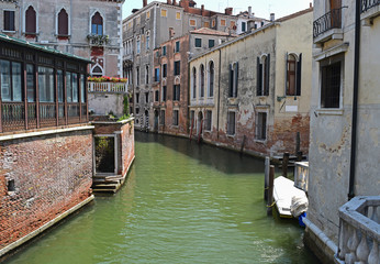 Obraz na płótnie Canvas Old buildings and a canal in Venice, Italy