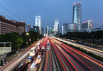 Fototapeta na wymiar Heavy traffic in Jakarta modern business district in Indonesia capital city