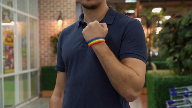 the young man demonstrates the LGBT attribute On the hand