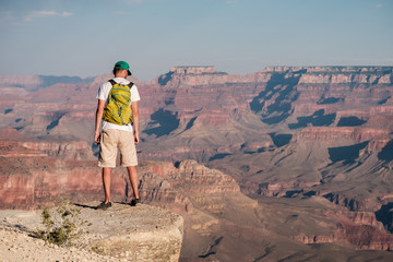 Fototapeta premium Tourist with backpack at Grand Canyon