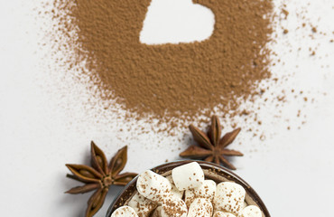 Valentine day background marshmellow, blue cup coffee cocoa powder star anis.