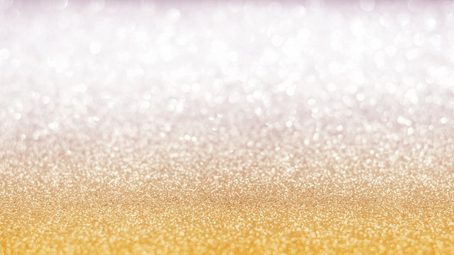 Gold silver blur glitter bokeh background with blurry white sparkling light of metallic texture shimmering backdrop for holiday decoration