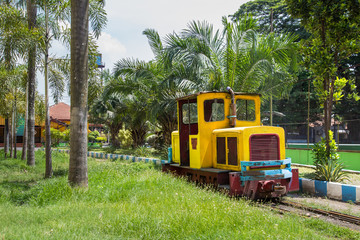 Vintage locomotive parked at a sugar plant near Surabaya in Indonesia