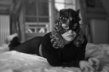 Seductive cat-woman in sexy costume