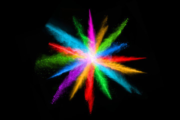 abstract colored dust explosion on a black background.abstract powder splatted background,Freeze motion of color powder exploding/throwing color powder, multicolored glitter texture.