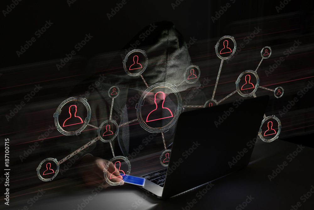 Poster hacker man in the dark using computer to hack data and information system