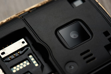 Obraz premium Close up of camera and sim slot