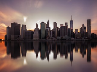 Fototapeta na wymiar NEW YORK, UNITED STATES OF AMERICA - APRIL 28, 2017: New York City Manhattan skyline panorama with skyscrapers building at dusk.