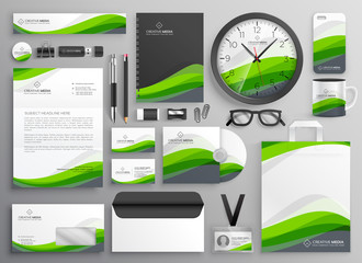 green wavy business stationery set template design for your brand