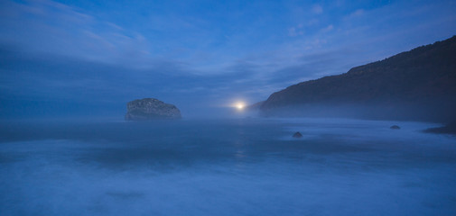 Fototapeta premium A sunset on the Basque coast, San Juan de Gaztelugatxe, Spain