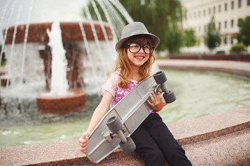 little hipster girl with big glasses