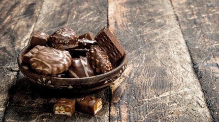 Chocolate candies in a bowl.